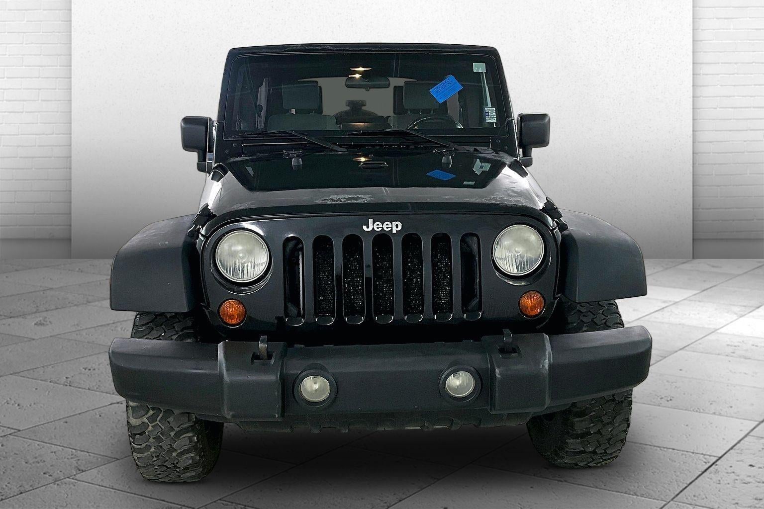 Used 2007 Jeep Wrangler Unlimited Rubicon with VIN 1J4GA69107L168945 for sale in Kansas City