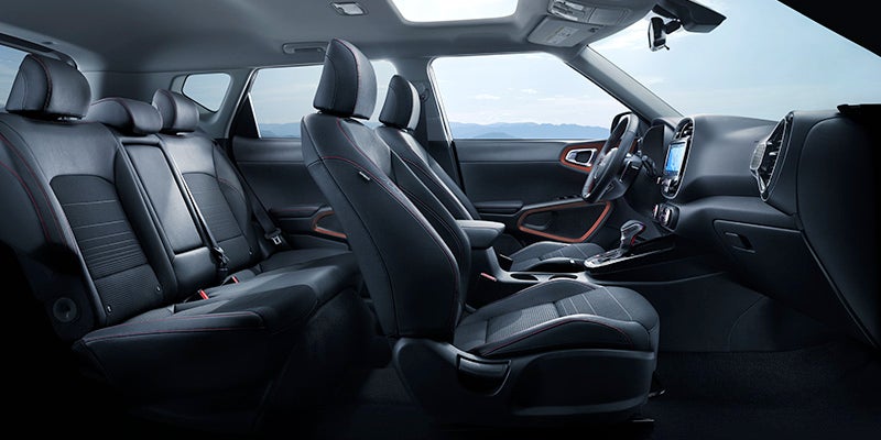 Kia Soul interior 2023 showing infotainment touchscreen, driver cockpit, and cabin layout