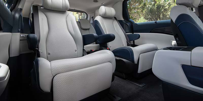 Kia Carnival Hybrid interior showing three-row seating and flexible cargo configuration