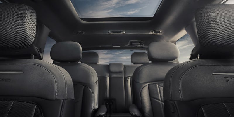 2027 Kia Telluride dashboard with panoramic displays and Kia Drive Wise safety technology