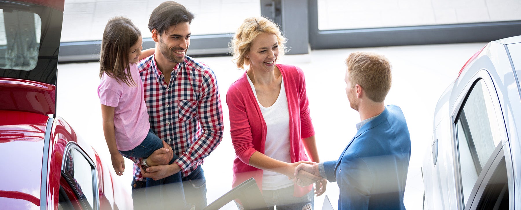 Customer shaking hands with employee